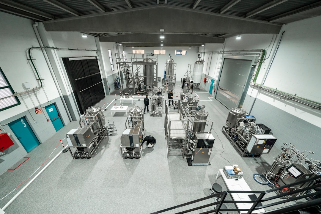 Inside a large industrial factory building.