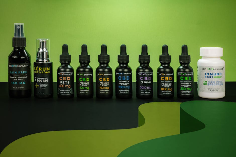 A variety of CBD jars and bottles on a vibrant green backdrop, Mexico City.